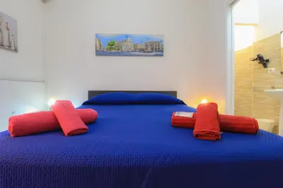 Letto o letti in una camera di BED&FLY NEAR AIRPORT CATANIA FONTANAROSSA BAGNO PRIVATO In CAMERA