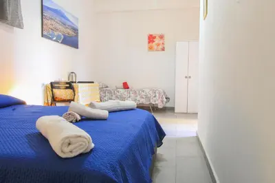 Letto o letti in una camera di BED&FLY NEAR AIRPORT CATANIA FONTANAROSSA BAGNO PRIVATO In CAMERA