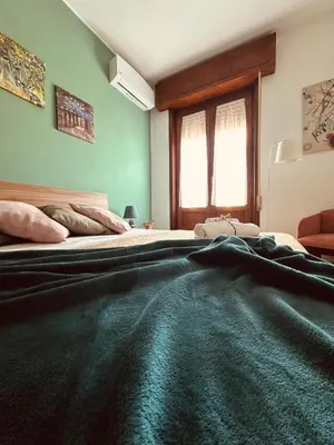 Letto o letti in una camera di Serendipity house