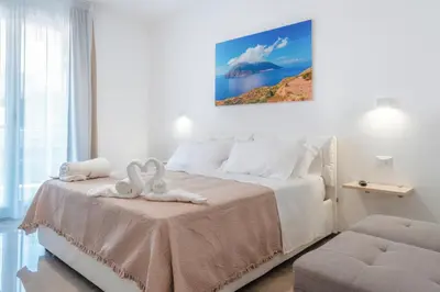 Letto o letti in una camera di Mediterraneo Palace Luxury Affittacamere