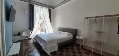 Letto o letti in una camera di Palazzo del Verga