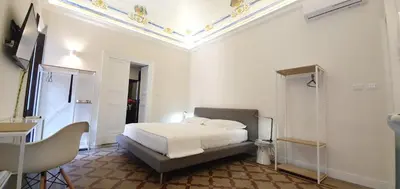 Letto o letti in una camera di Palazzo del Verga