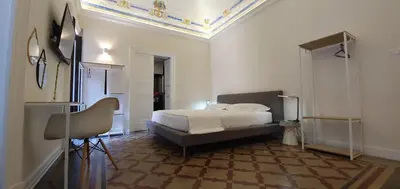 Letto o letti in una camera di Palazzo del Verga