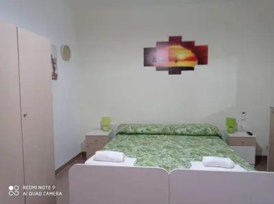 Letto o letti in una camera di Casa Vico Lepre