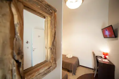 TV o dispositivi per l'intrattenimento presso B&B Ninfeo Siracusa - Rooms & Breakfast