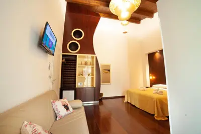 TV o dispositivi per l'intrattenimento presso B&B Ninfeo Siracusa - Rooms & Breakfast