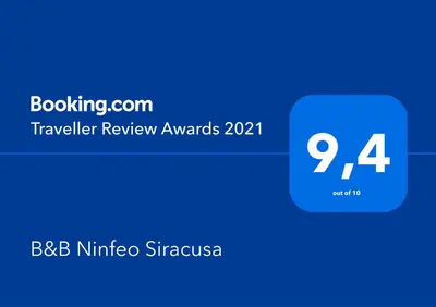 Certificato, attestato, insegna o altro documento esposto da B&B Ninfeo Siracusa - Rooms & Breakfast