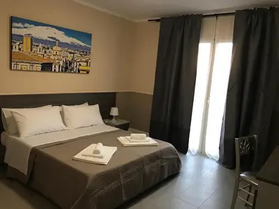 Letto o letti in una camera di Borgo Palombaio