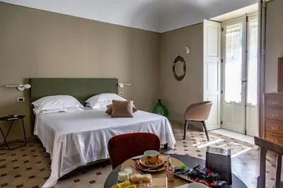 Letto o letti in una camera di Casa dei Giurati