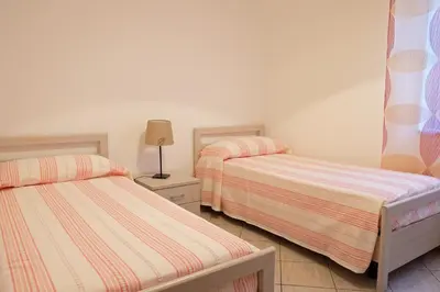 Letto o letti in una camera di CASA TERRE BAROCCHE