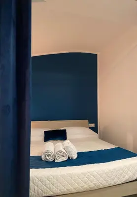 Letto o letti in una camera di CIVITAS 2