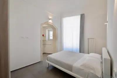 Letto o letti in una camera di Ortigia Fab Apartment
