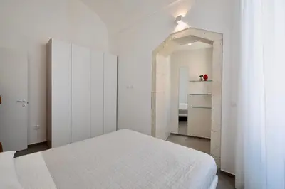 Letto o letti in una camera di Ortigia Fab Apartment