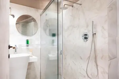 Bagno di Scene Suites Apartments