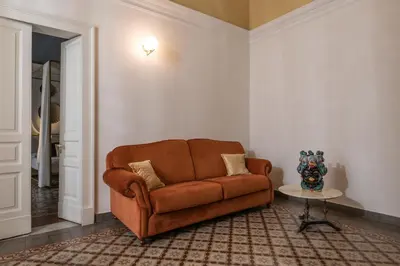 Area soggiorno di Scene Suites Apartments
