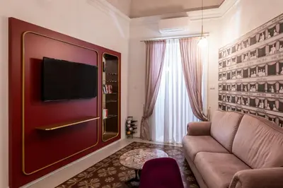 TV o dispositivi per l'intrattenimento presso Scene Suites Apartments