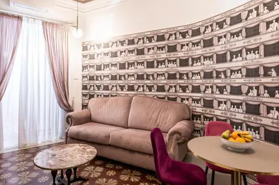Area soggiorno di Scene Suites Apartments