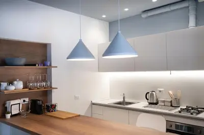 Cucina o angolo cottura di Sant'Agostino Luxury Apartments