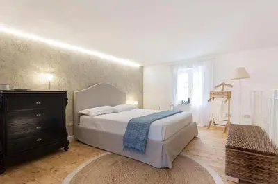 Letto o letti in una camera di Ammari Ortigia Apartment