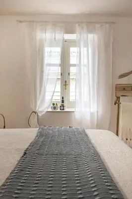 Letto o letti in una camera di Ammari Ortigia Apartment