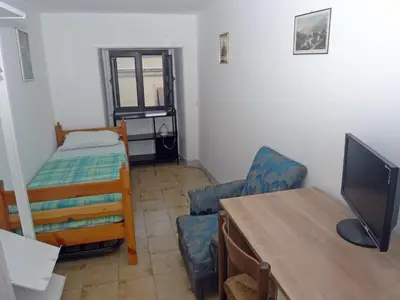 Letto o letti in una camera di AG HOME ADRAGNA