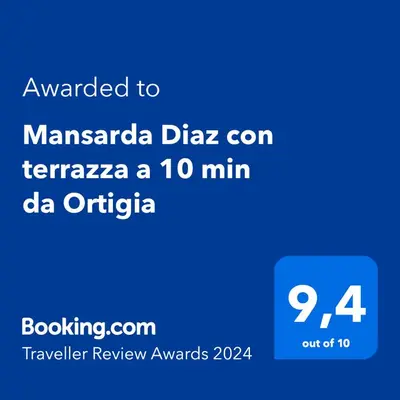 Certificato, attestato, insegna o altro documento esposto da Mansarda Diaz con terrazza a 10 min da Ortigia