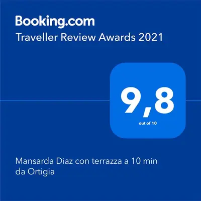 Certificato, attestato, insegna o altro documento esposto da Mansarda Diaz con terrazza a 10 min da Ortigia