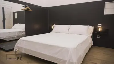 Letto o letti in una camera di P4 Ortigia_Siracusa