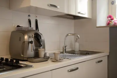 Cucina o angolo cottura di Ortigia Guest House Casa Flora