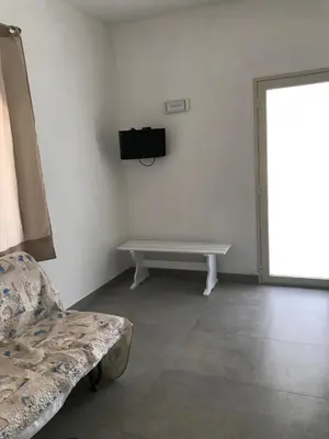 TV o dispositivi per l'intrattenimento presso Casa vacanza le tre palme