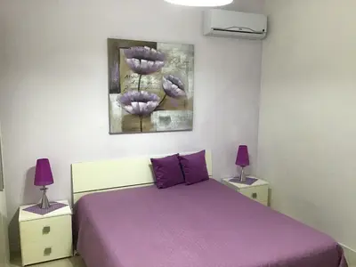 Letto o letti in una camera di B&B Villa Tania