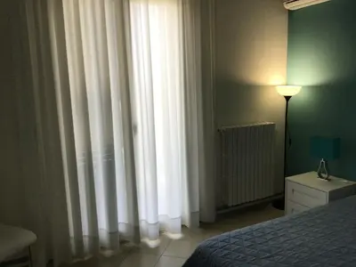 Letto o letti in una camera di B&B Villa Tania