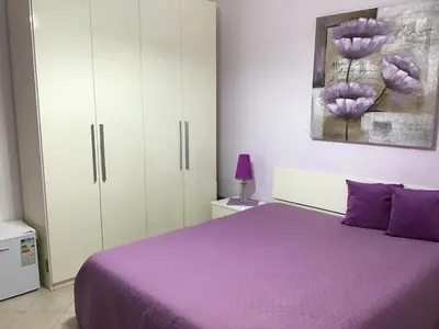 Letto o letti in una camera di B&B Villa Tania