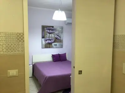 Letto o letti in una camera di B&B Villa Tania
