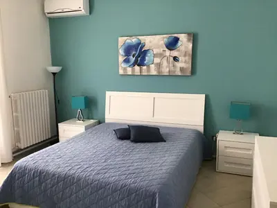 Letto o letti in una camera di B&B Villa Tania