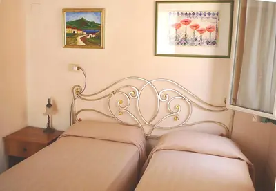 Letto o letti in una camera di Agriturismo Limoneto
