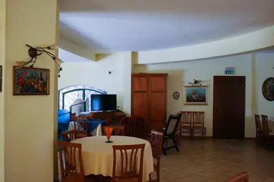 Area soggiorno di Arenella Beach Rooms