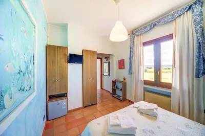 Letto o letti in una camera di B&B Sicilia Bella