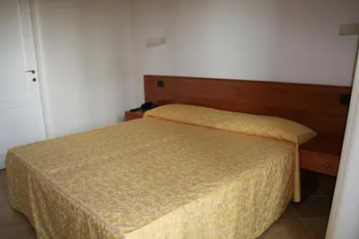 Letto o letti in una camera di Bed And Breakfast Perla Del Sole