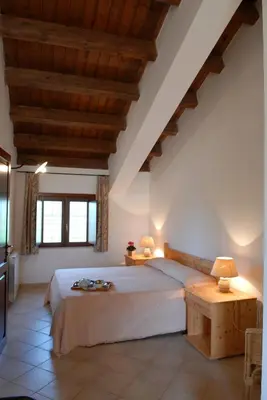 Letto o letti in una camera di San Domenico Residence