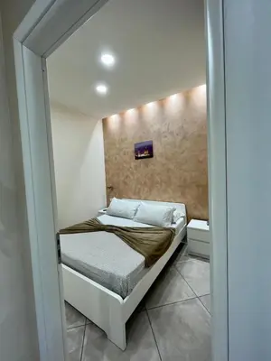 Letto o letti in una camera di Casa Ferdinandea