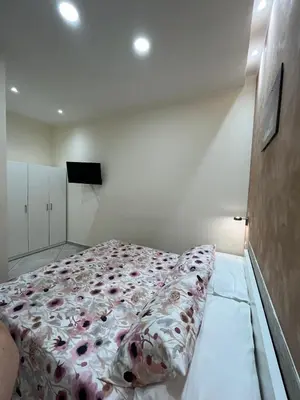 Letto o letti in una camera di Casa Ferdinandea