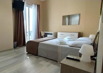 Letto o letti in una camera di Giliberto Rooms