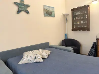 Letto o letti in una camera di Casa Filemone
