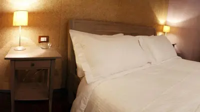 Letto o letti in una camera di Garden Holiday