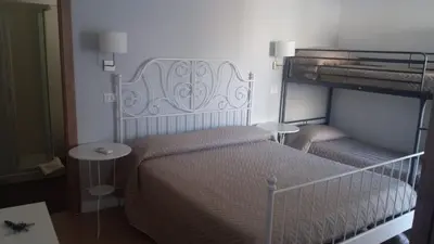 Letto o letti in una camera di B&B Del Carmine