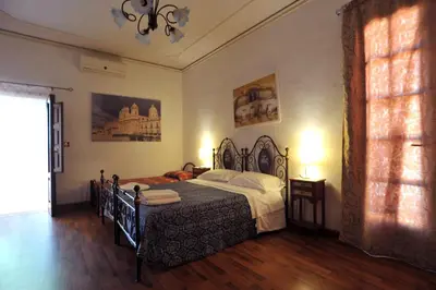 Letto o letti in una camera di Il Giardino Di Pietra