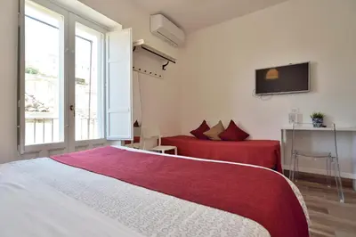Letto o letti in una camera di Modica Old Town Rooms