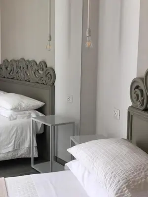 Letto o letti in una camera di Room 55
