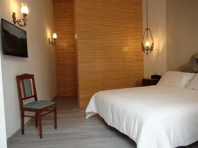Letto o letti in una camera di Room 55